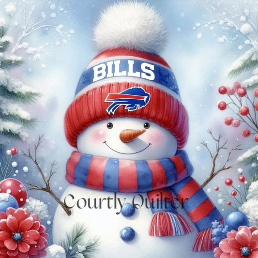 Courtly Quilter snowman wearing a Buffalo Bills hat and scarf in a snowy scene with flowers and branches.