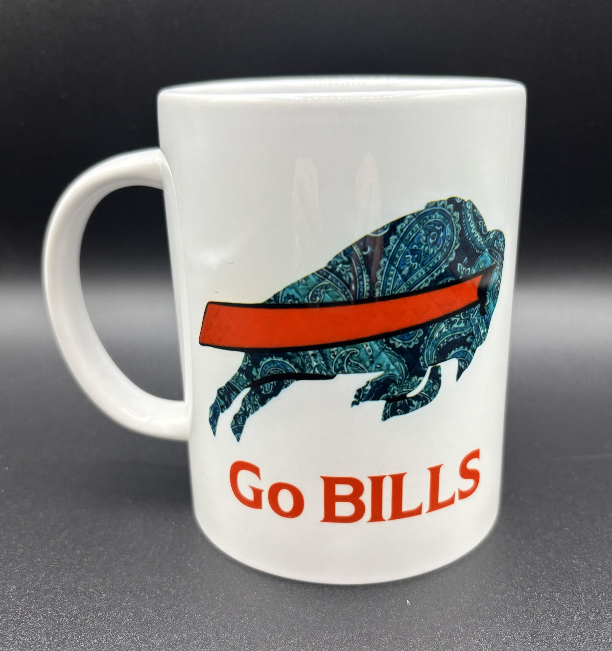 Ceramic mug with a blue paisley design of a buffalo and 'Go Bills' text, Buffalo Bills, Courtly Quilter