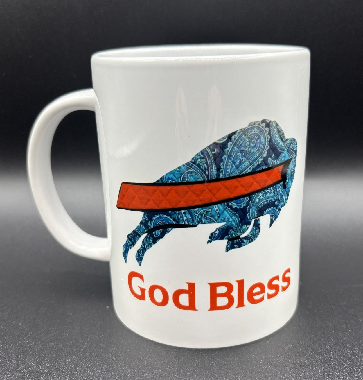Ceramic mug with blue paisley buffalo and 'God Bless' text, Buffalo Bills, Courtly Quilter