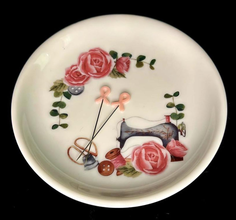 Courtly Quilter decorative magnetic base pin dish with floral and sewing-themed design on a white background
