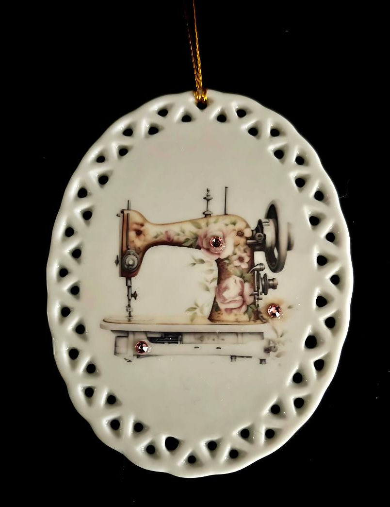 Courtly Quilter oval ceramic ornament with lace edging, decorative ivory and gold sewing machine decorated with flowers and crystals