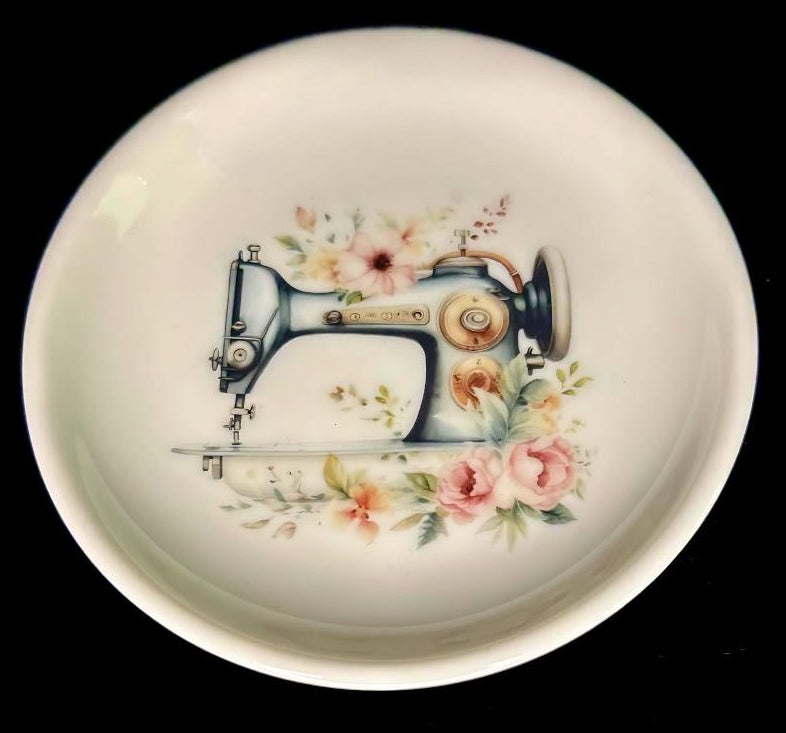 Courtly Quilter decorative magnetic base pin dish with floral and sewing-themed design on a white background