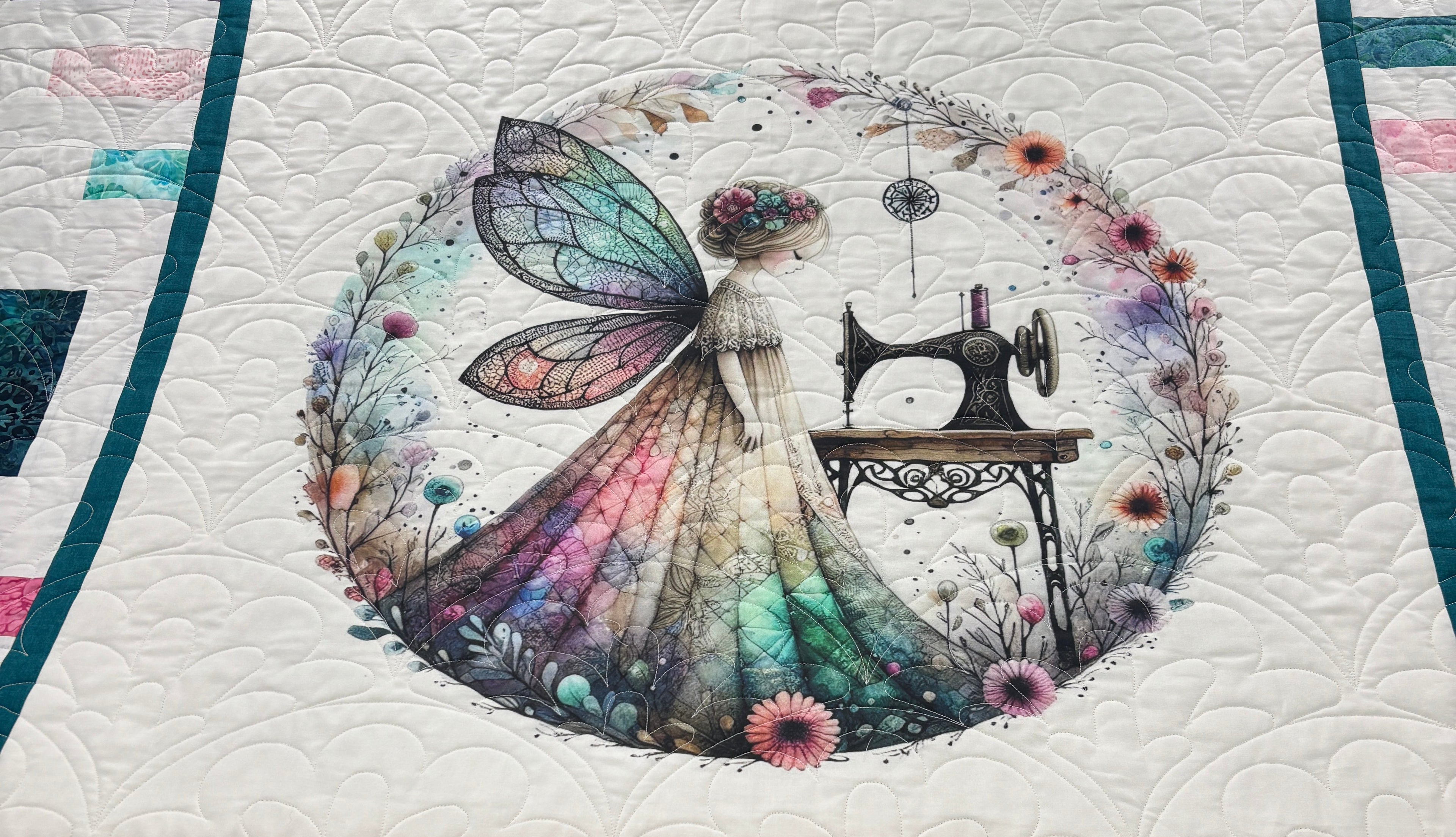 Quilt with fairy panel in the middle