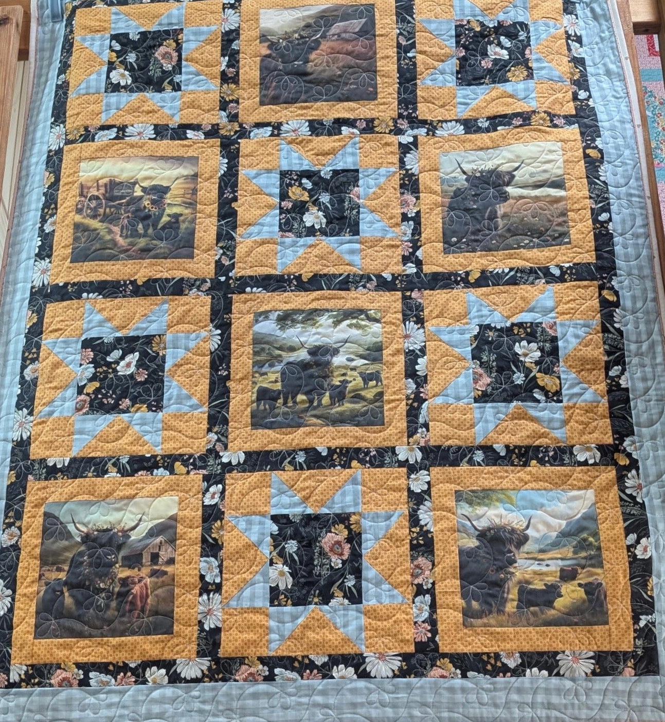 Quilt with cow blocks