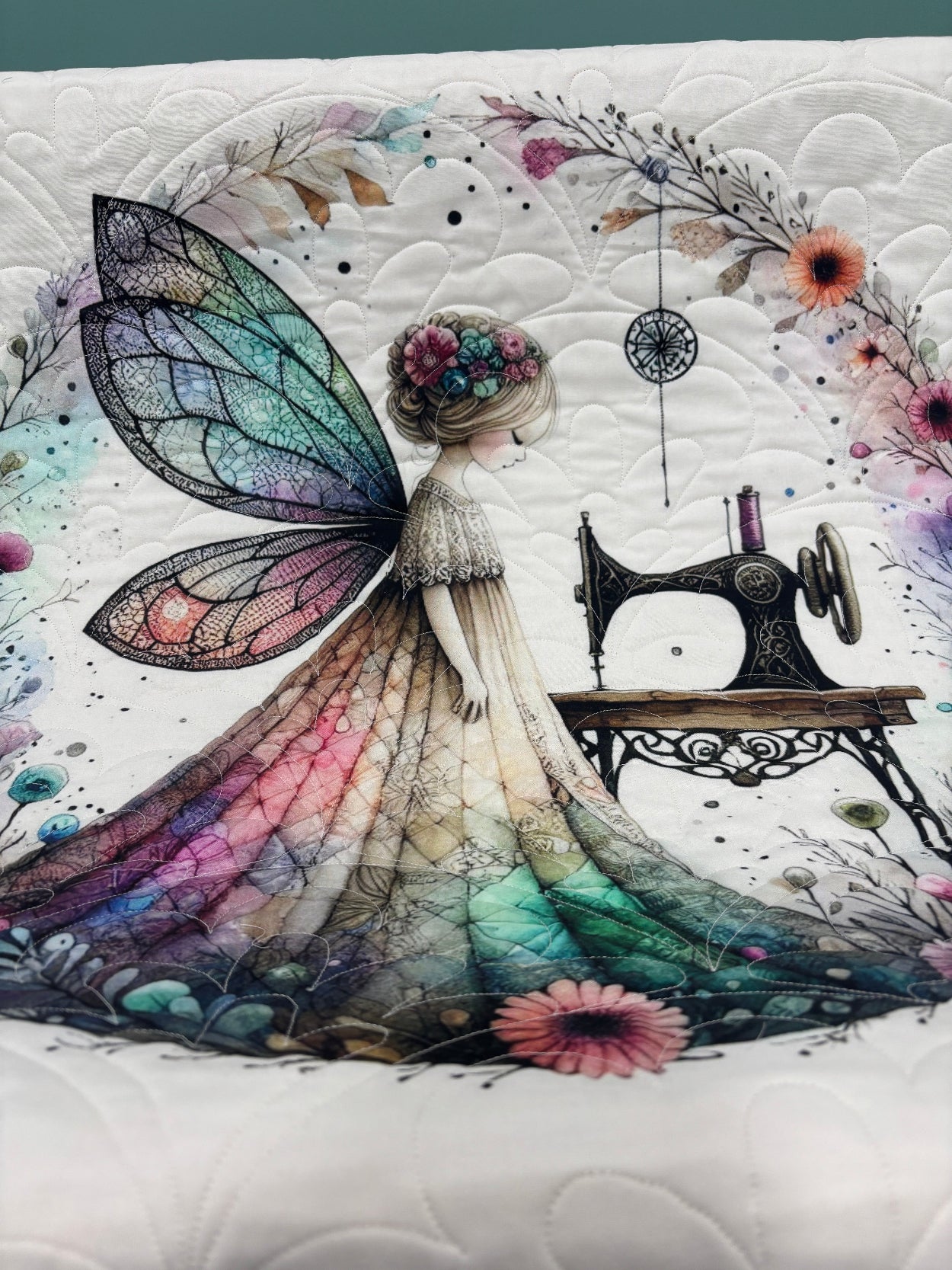 Sewing fairy panel after longarm close-up