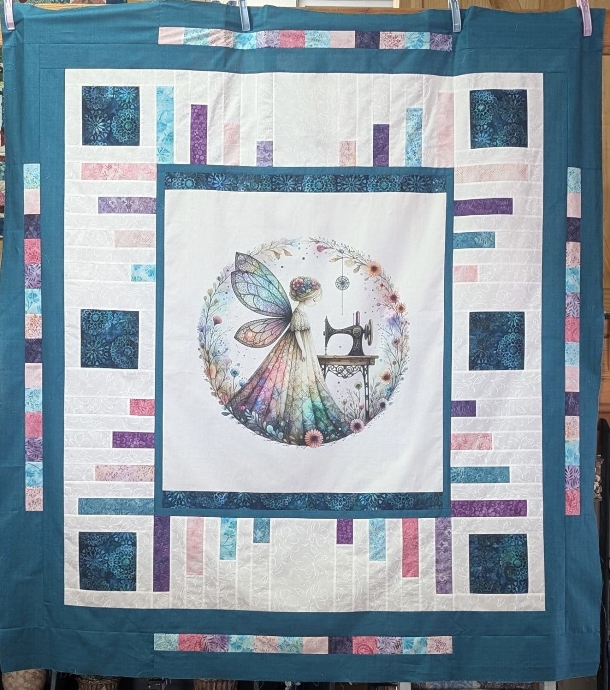 sewing fairy quilt before longarm