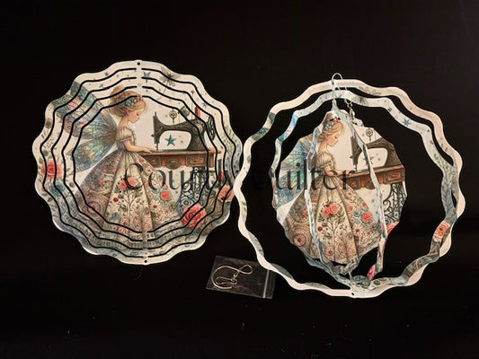 Courtly Quilter sewing fairy design with vintage sewing machine on both sides of wind spinner.