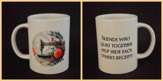 Courtly Quilter ceramic mug with white and gold sewing machine, orange rose, gray leaves and quote "friends who quilt together help hide each other's receipts"