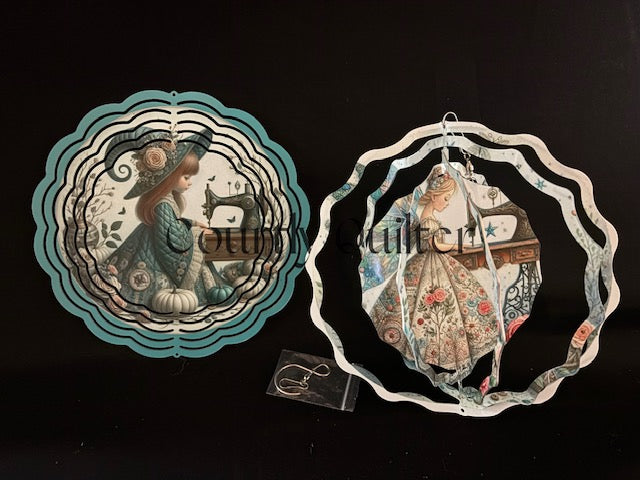 Courtly Quilter design of sewing fairy and vintage sewing machine on both sides of wind spinner