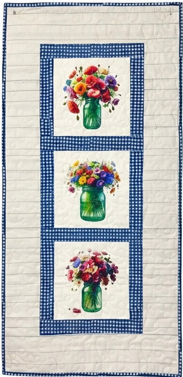Vertical wall hanging with three blocks featuring mason jars with summer bouquets 