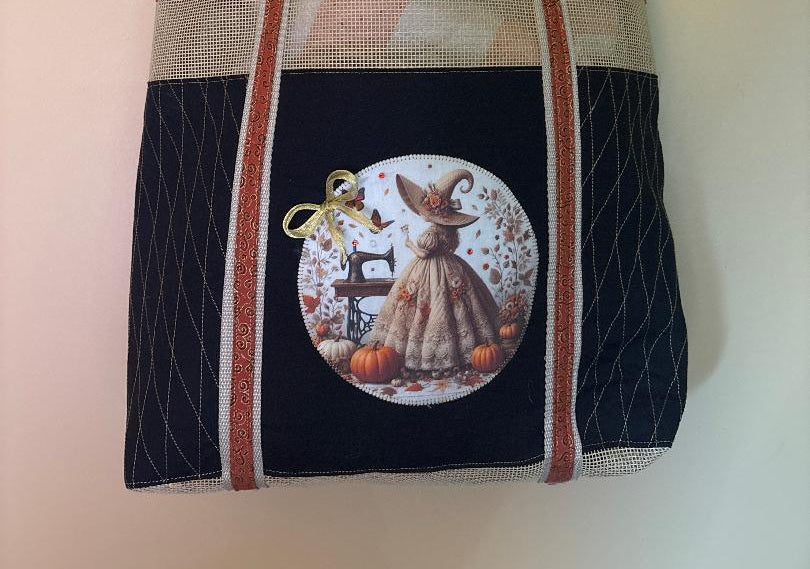 Tote bag with a Courtly Quilter decorative sewing fairy design 